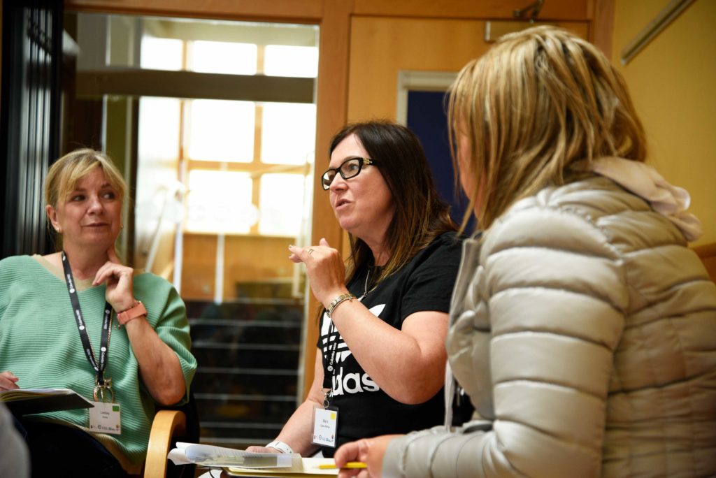 3 people in discussion