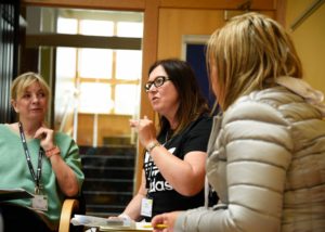 3 people in discussion